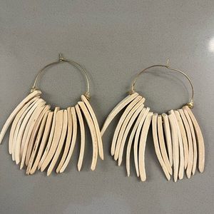 Summer Steinfeld handmade bone hoop earrings.